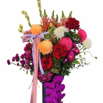 The Queen "Large Lush Vase Arrangement With Hanging  Phalaenopsis Orchid "